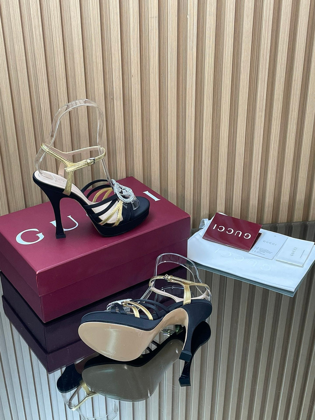 GUCCI 26S HIGH-HEELED SANDALS 125 MM IN BLACK SATIN AND GOLD CALFSKIN