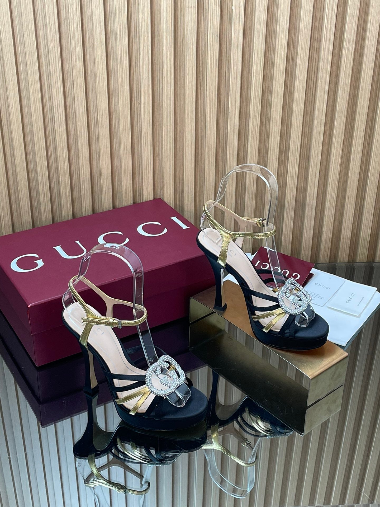 GUCCI 26S HIGH-HEELED SANDALS 125 MM IN BLACK SATIN AND GOLD CALFSKIN