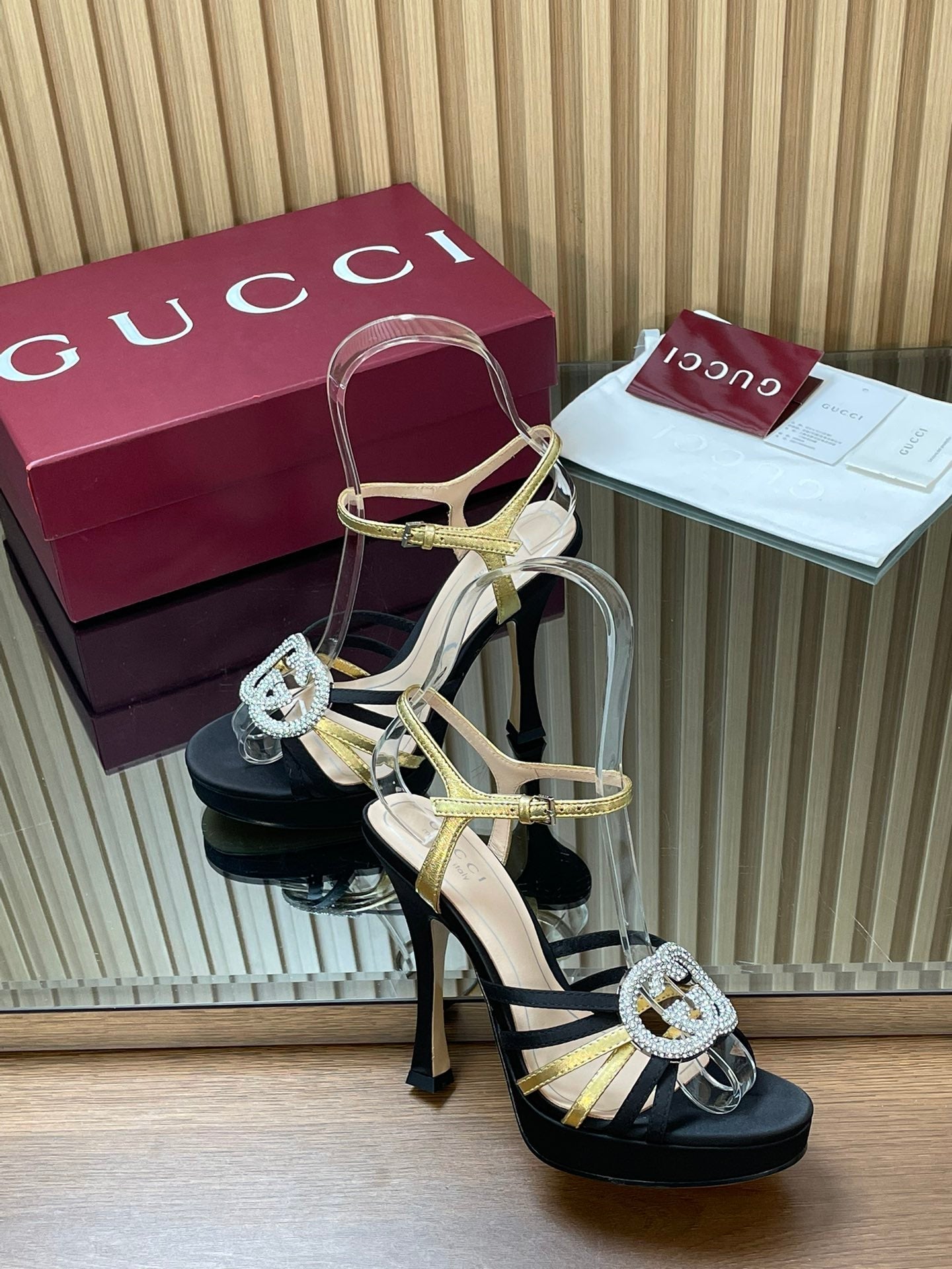 GUCCI 26S HIGH-HEELED SANDALS 125 MM IN BLACK SATIN AND GOLD CALFSKIN