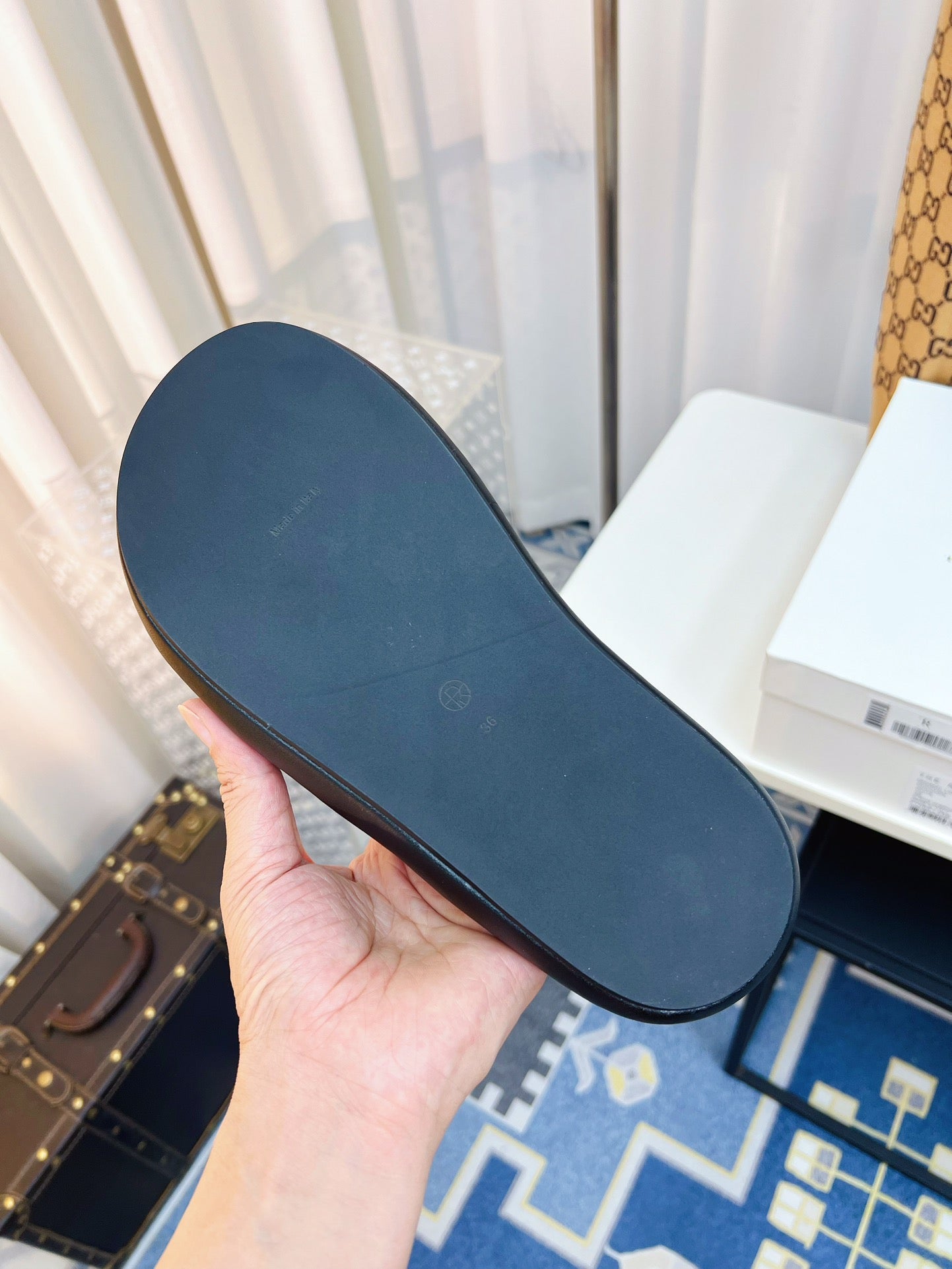 THE ROW 26S CROSSED PADDED SLIDES IN BLACK CALFSKIN