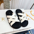 THE ROW 26S CROSSED PADDED SLIDES IN WHITE CALFSKIN