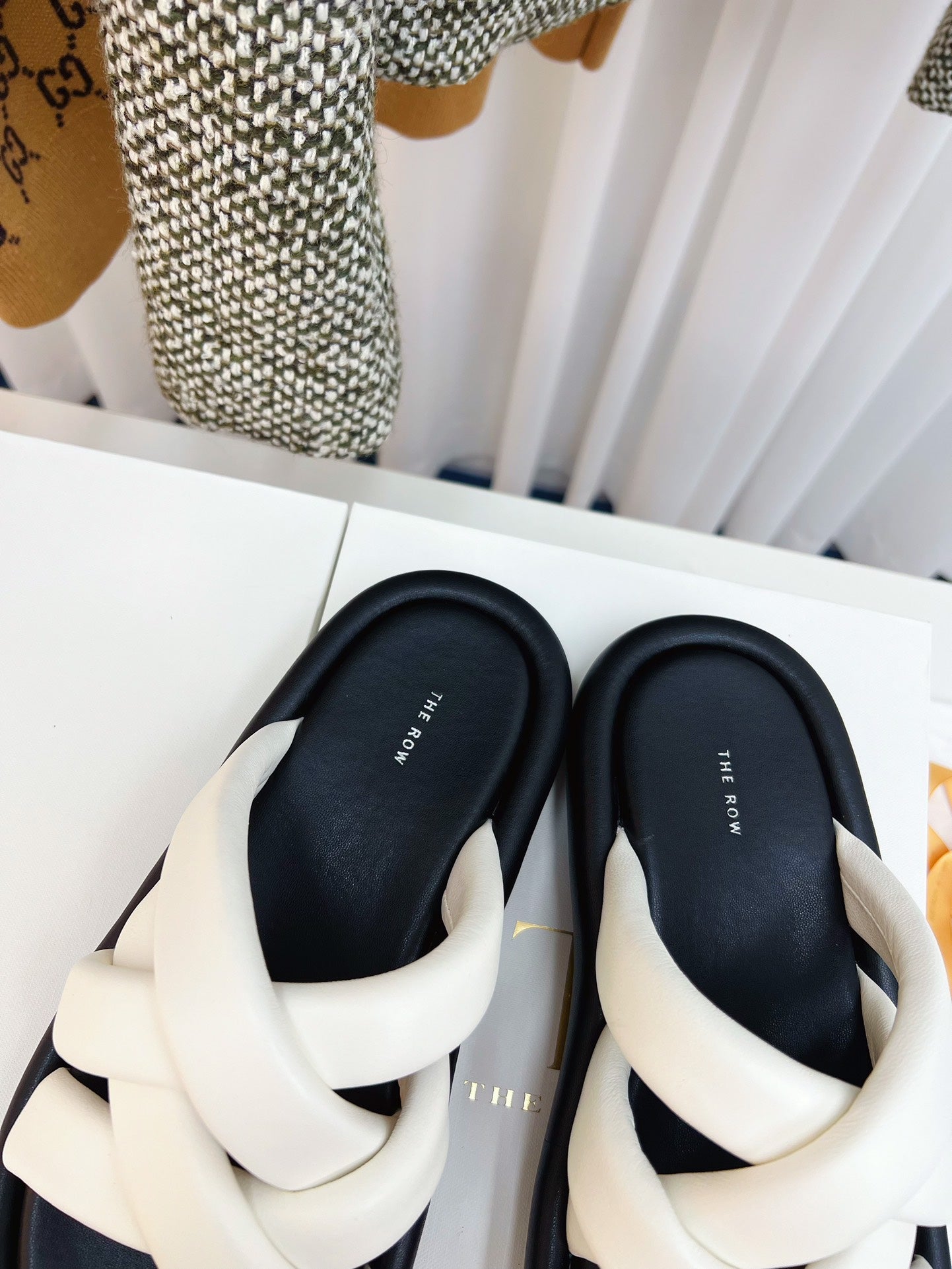 THE ROW 26S CROSSED PADDED SLIDES IN WHITE CALFSKIN
