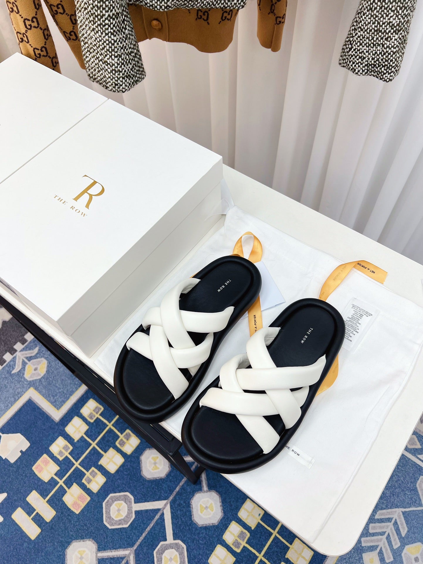 THE ROW 26S CROSSED PADDED SLIDES IN WHITE CALFSKIN