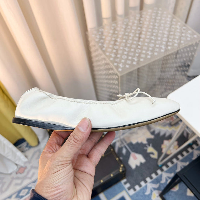 THE ROW 26S BALLET FLATS IN IVORY WHITE CALFSKIN ELASTIC TRIM WITH BOW