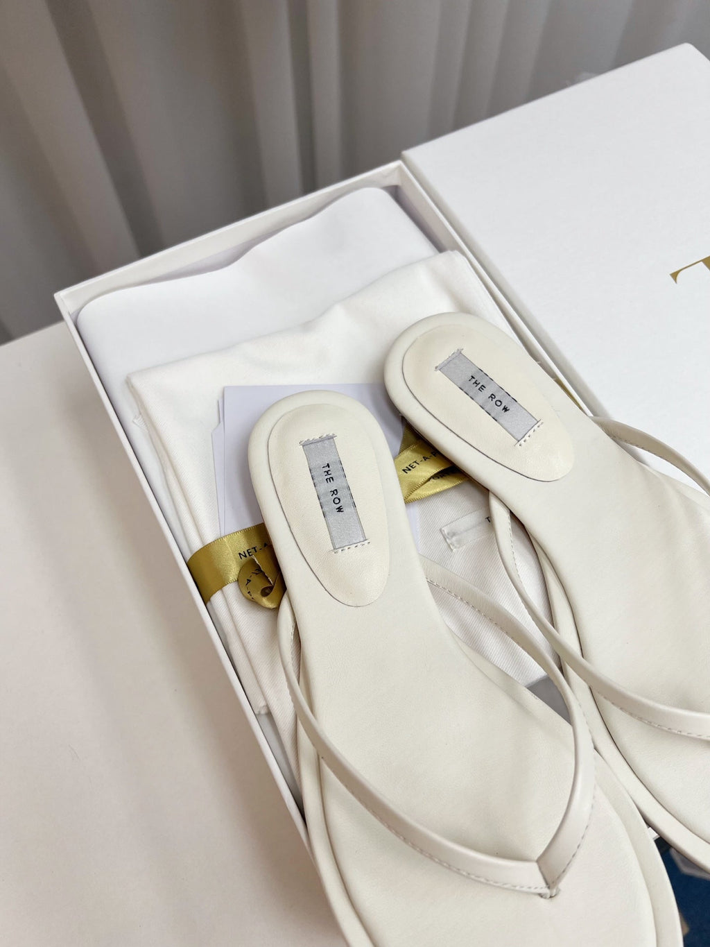 THE ROW 26S THONG SANDALS IN WHITE CALFSKIN