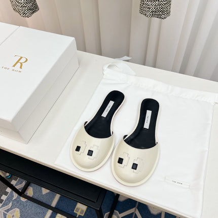 THE ROW 26S PIXEL APPLIQUE MULES IN IVORY WHITE CALFSKIN