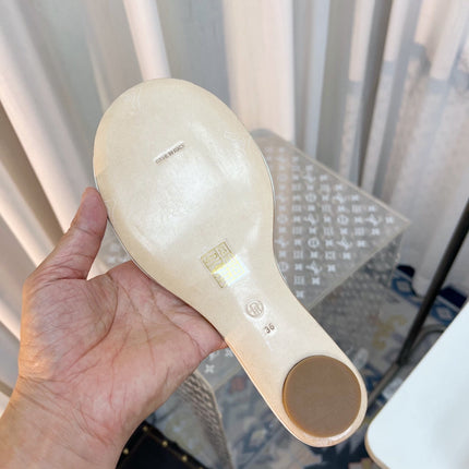 THE ROW 26S PIXEL APPLIQUE MULES IN IVORY WHITE CALFSKIN