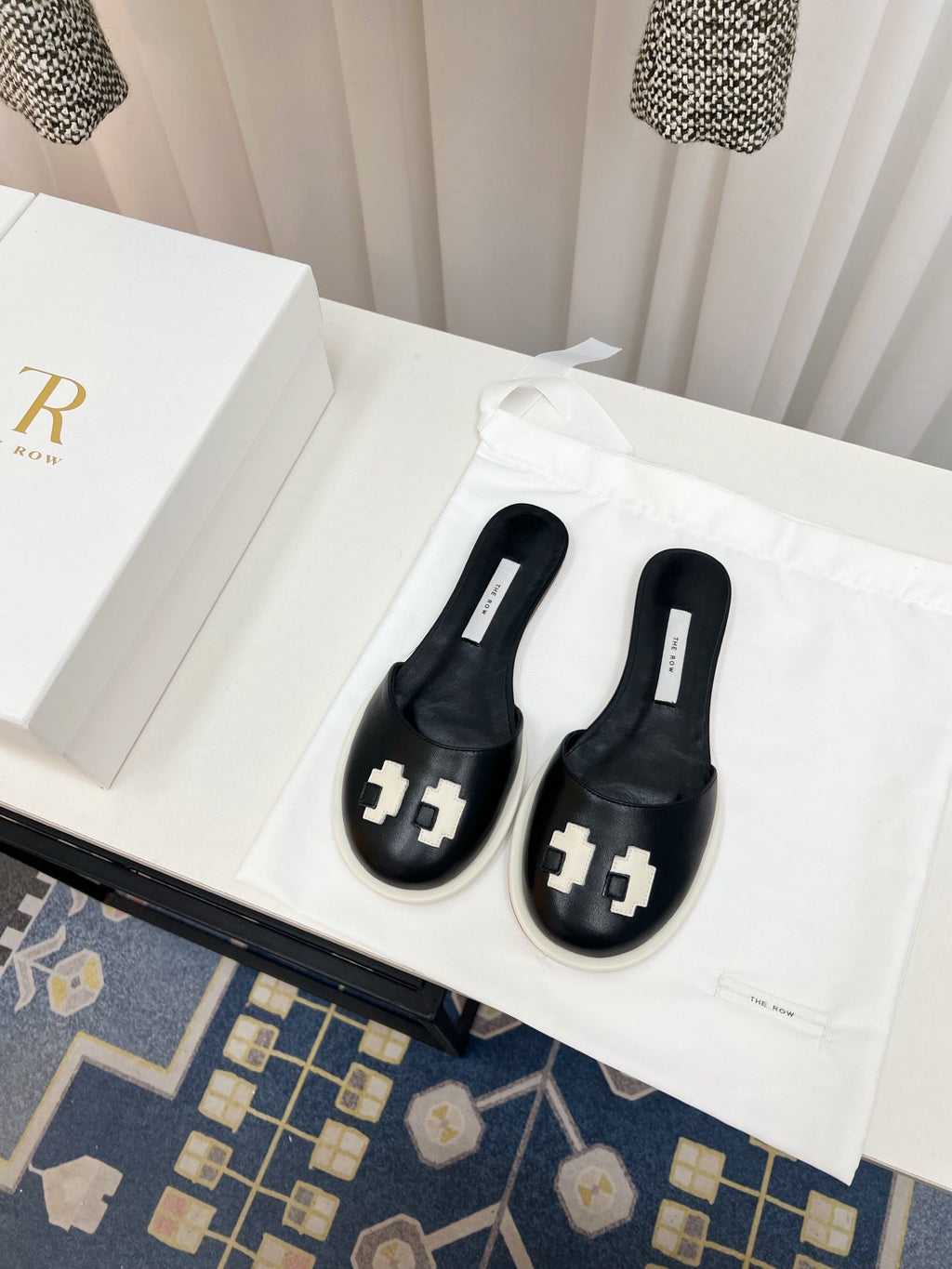 THE ROW 26S PIXEL APPLIQUE MULES IN BLACK CALFSKIN