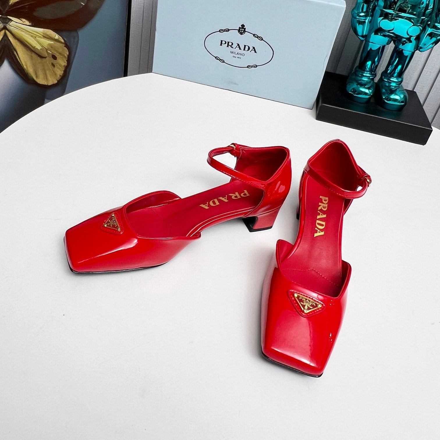 PRADA 26S ANKLE STRAP PUMPS 40MM IN RED PATENT CALFSKIN TRIANGLE LOGO
