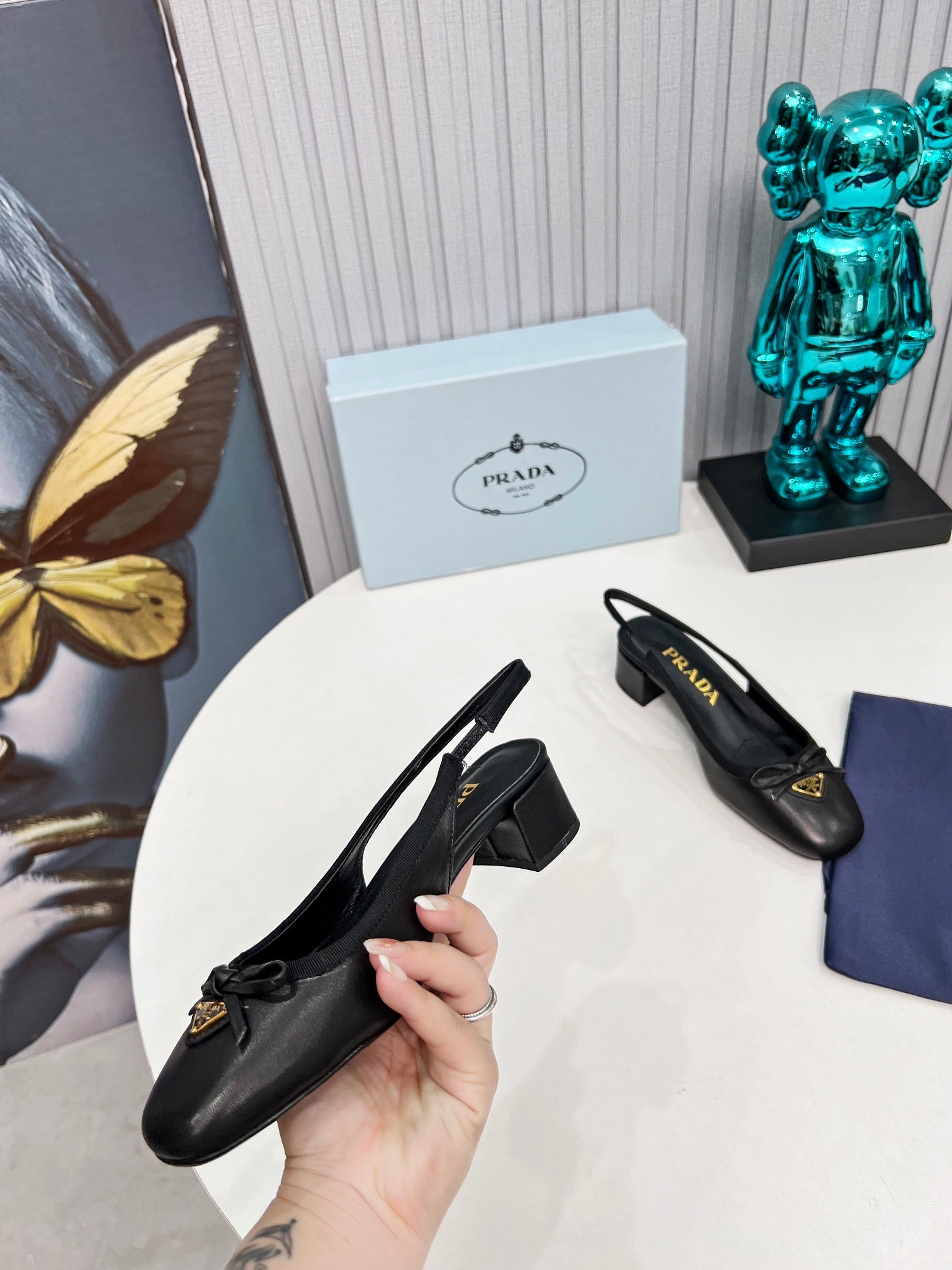 PRADA 26S ROUND TOE SLINGBACK PUMPS 40MM IN BLACK CALFSKIN WITH BOW