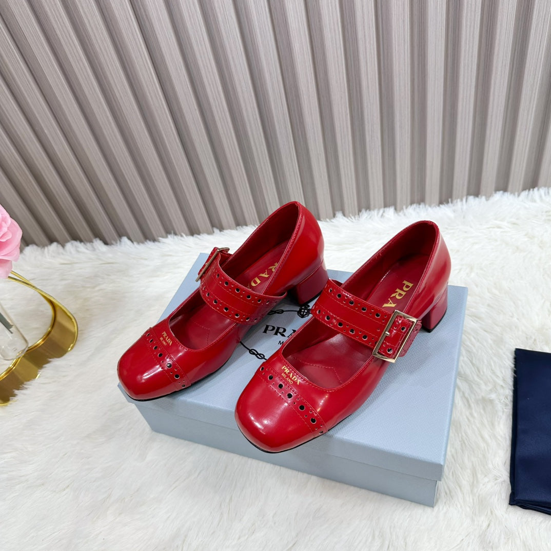 PRADA 26S ROUND TOE MARY JANE 40MM IN RED PATENT CALFSKIN WITH STUD DETAIL