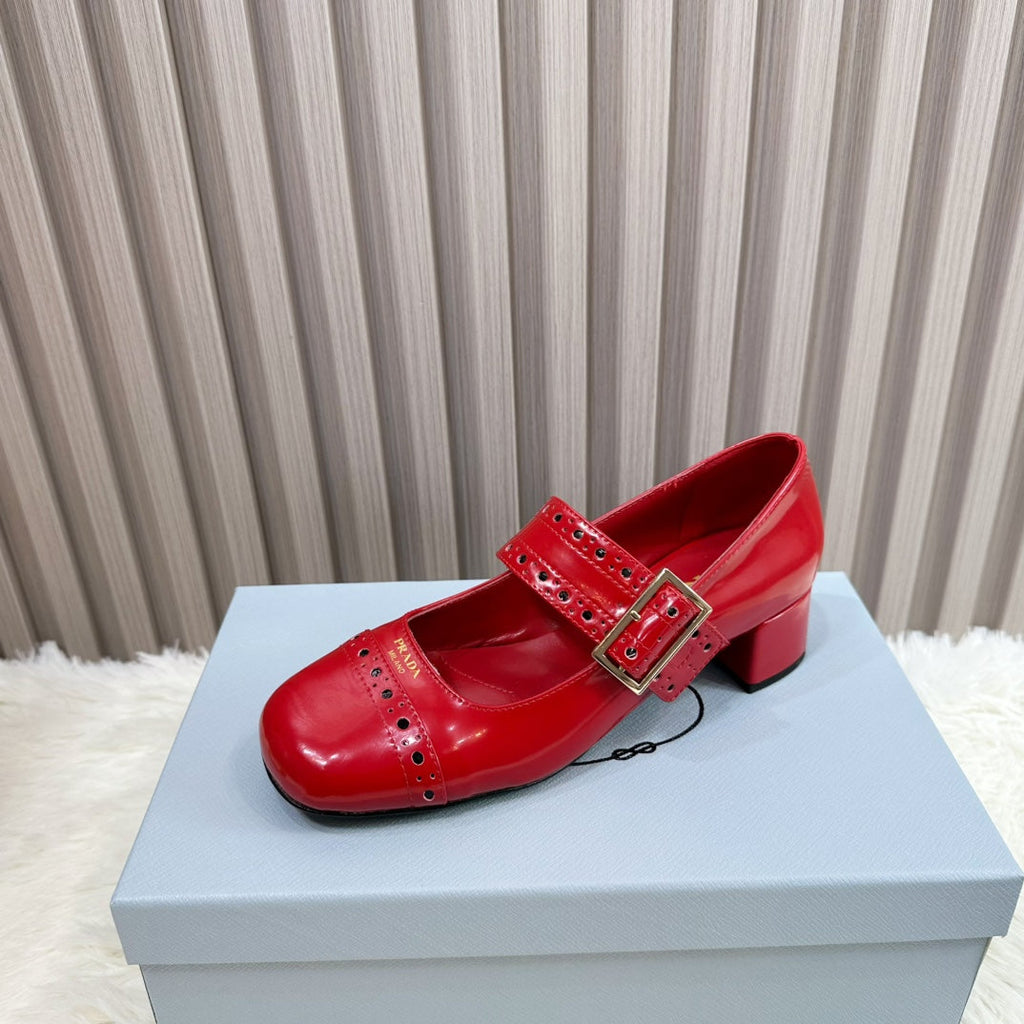 PRADA 26S ROUND TOE MARY JANE 40MM IN RED PATENT CALFSKIN WITH STUD DETAIL