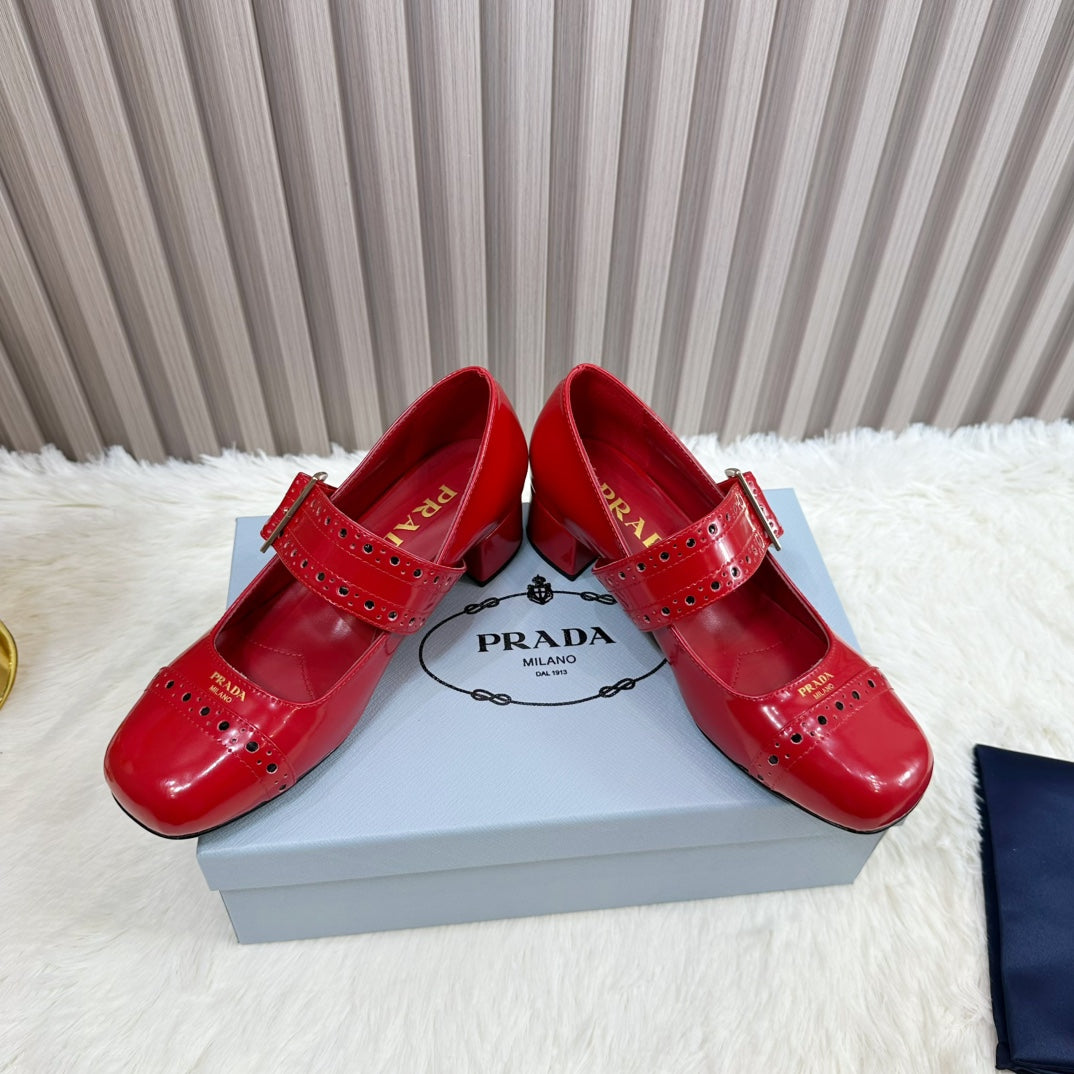 PRADA 26S ROUND TOE MARY JANE 40MM IN RED PATENT CALFSKIN WITH STUD DETAIL