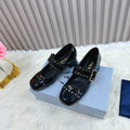 PRADA 26S ROUND TOE MARY JANE 40MM IN BLACK PATENT CALFSKIN WITH STUD DETAIL