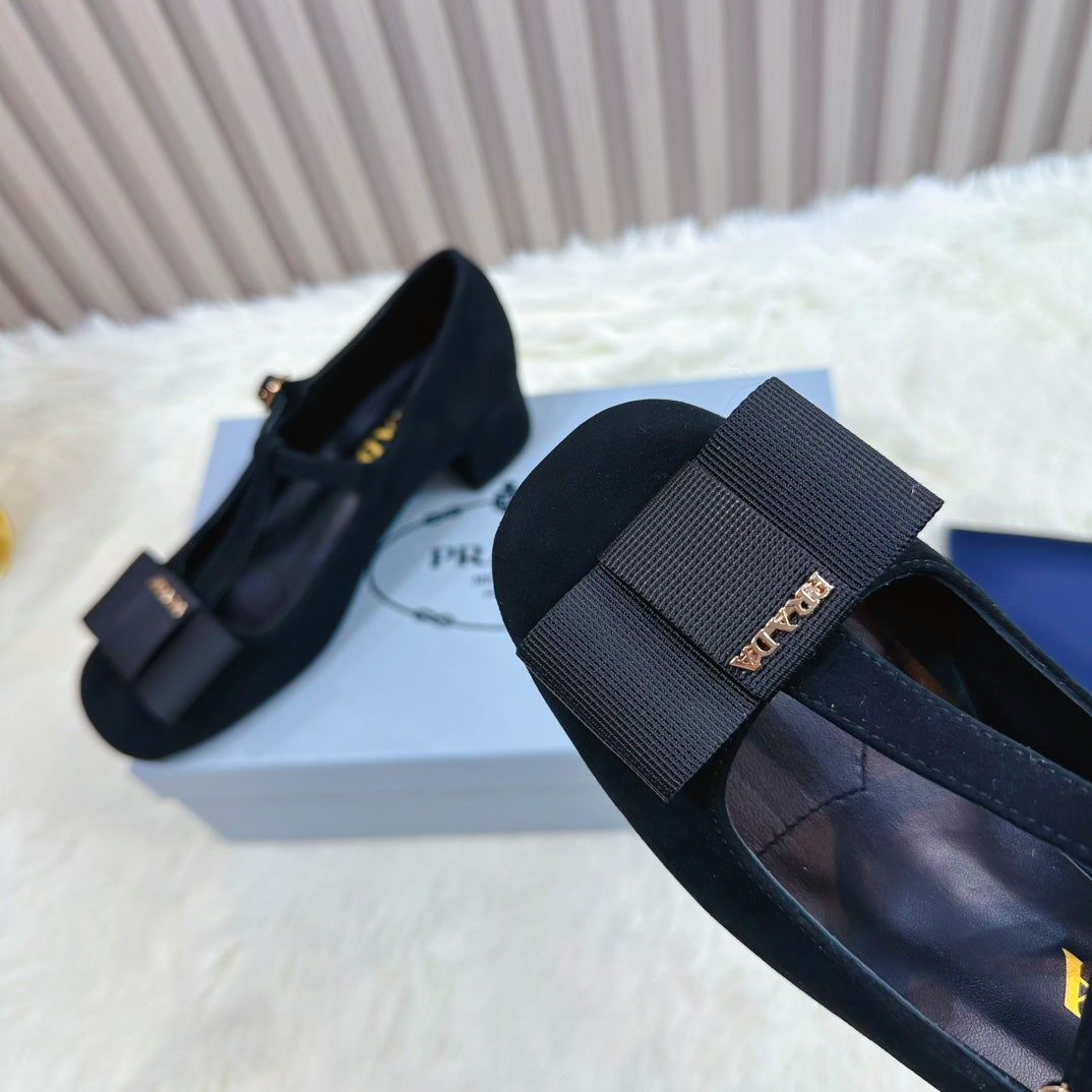 PRADA 26S T-STRAP MARY JANE PUMPS 40MM IN BLACK SUEDE WITH BOW