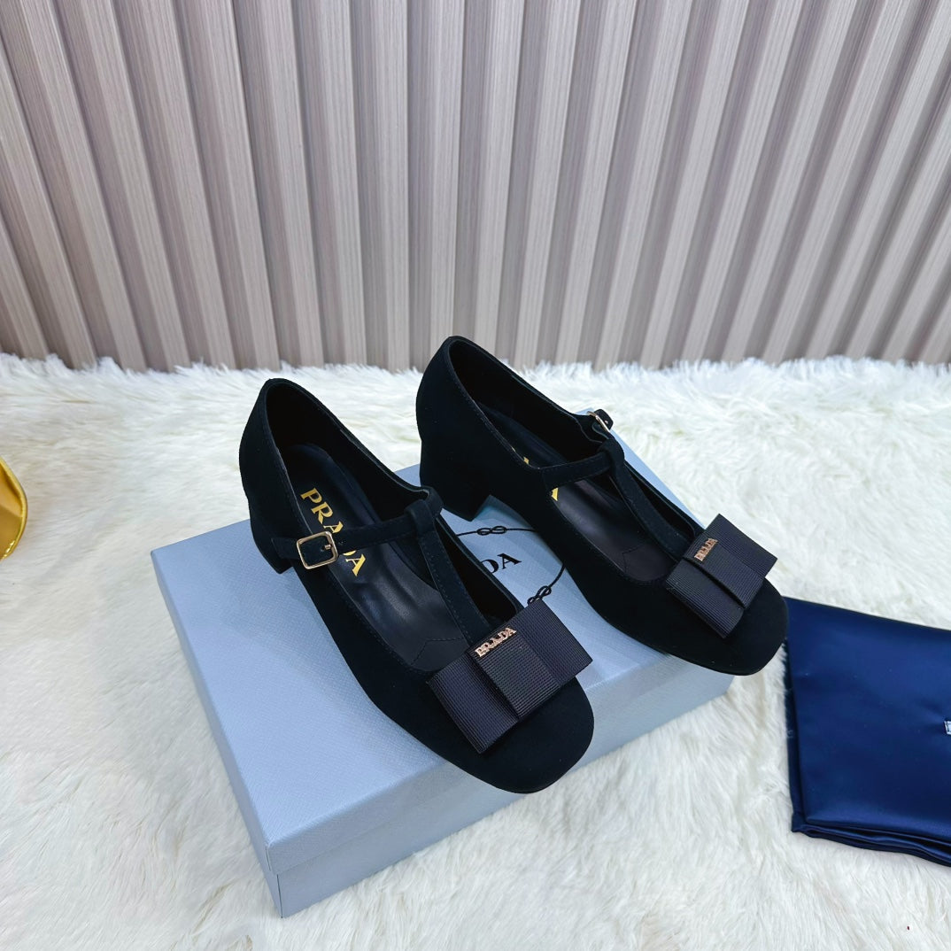 PRADA 26S T-STRAP MARY JANE PUMPS 40MM IN BLACK SUEDE WITH BOW