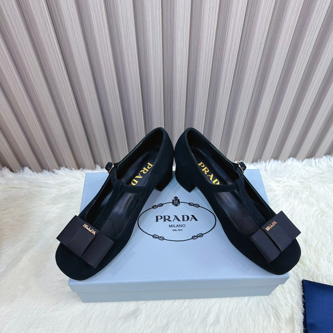 PRADA 26S T-STRAP MARY JANE PUMPS 40MM IN BLACK SUEDE WITH BOW