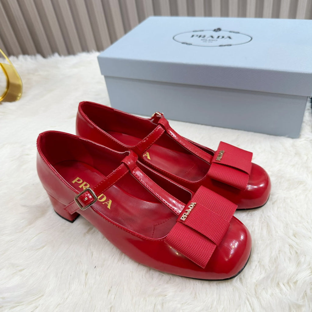 PRADA 26S T-STRAP MARY JANE PUMPS 40MM IN RED PATENT CALFSKIN WITH BOW