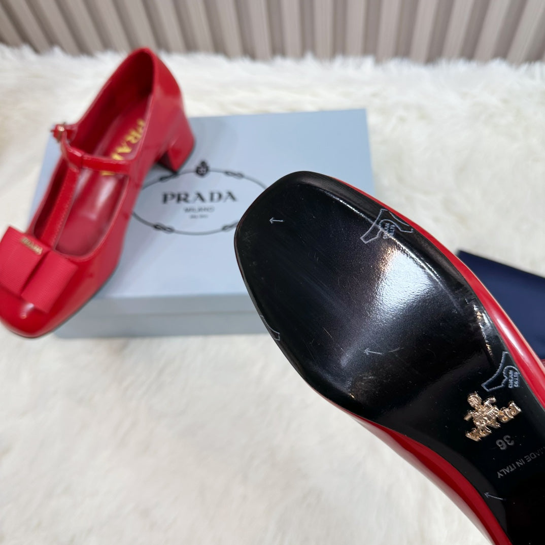 PRADA 26S T-STRAP MARY JANE PUMPS 40MM IN RED PATENT CALFSKIN WITH BOW