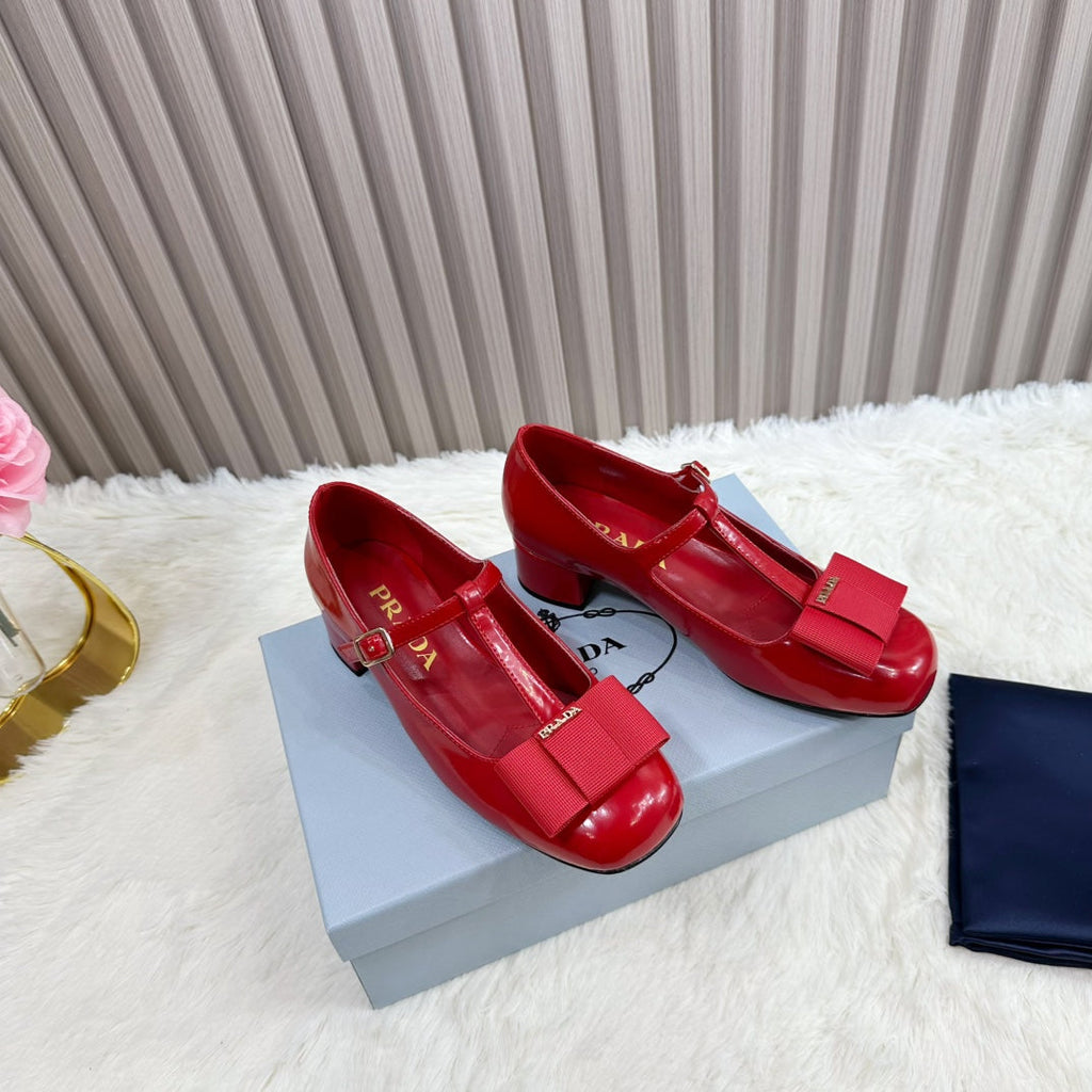 PRADA 26S T-STRAP MARY JANE PUMPS 40MM IN RED PATENT CALFSKIN WITH BOW