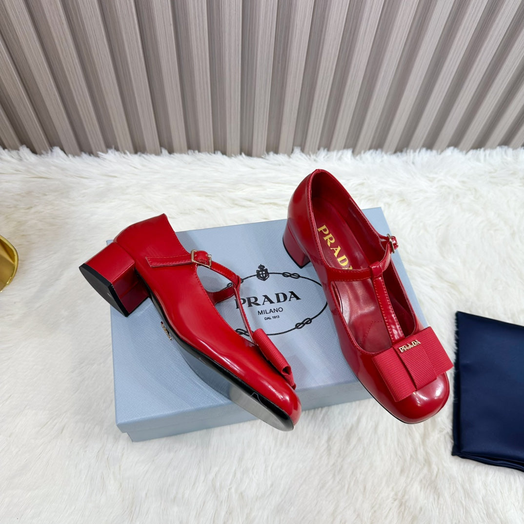 PRADA 26S T-STRAP MARY JANE PUMPS 40MM IN RED PATENT CALFSKIN WITH BOW