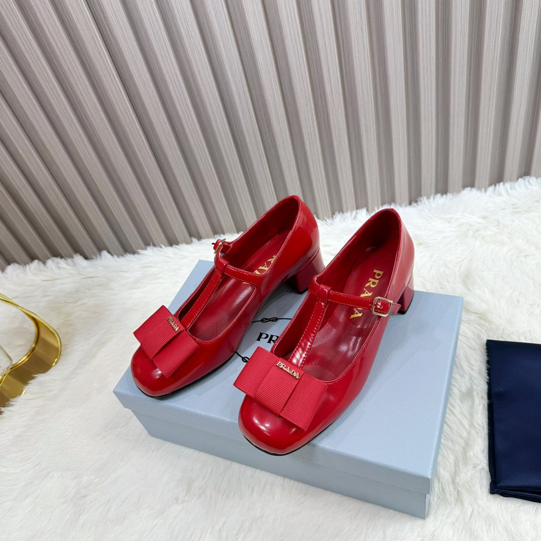 PRADA 26S T-STRAP MARY JANE PUMPS 40MM IN RED PATENT CALFSKIN WITH BOW
