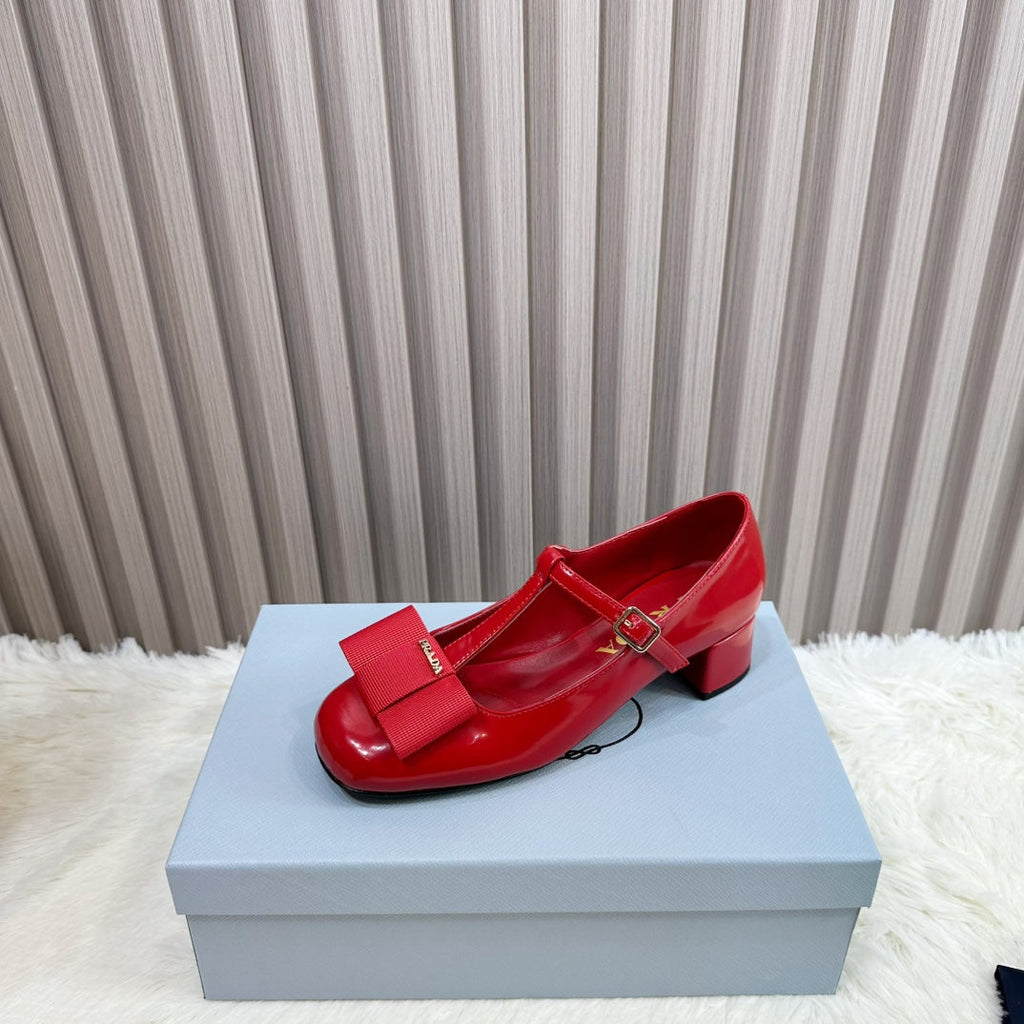 PRADA 26S T-STRAP MARY JANE PUMPS 40MM IN RED PATENT CALFSKIN WITH BOW