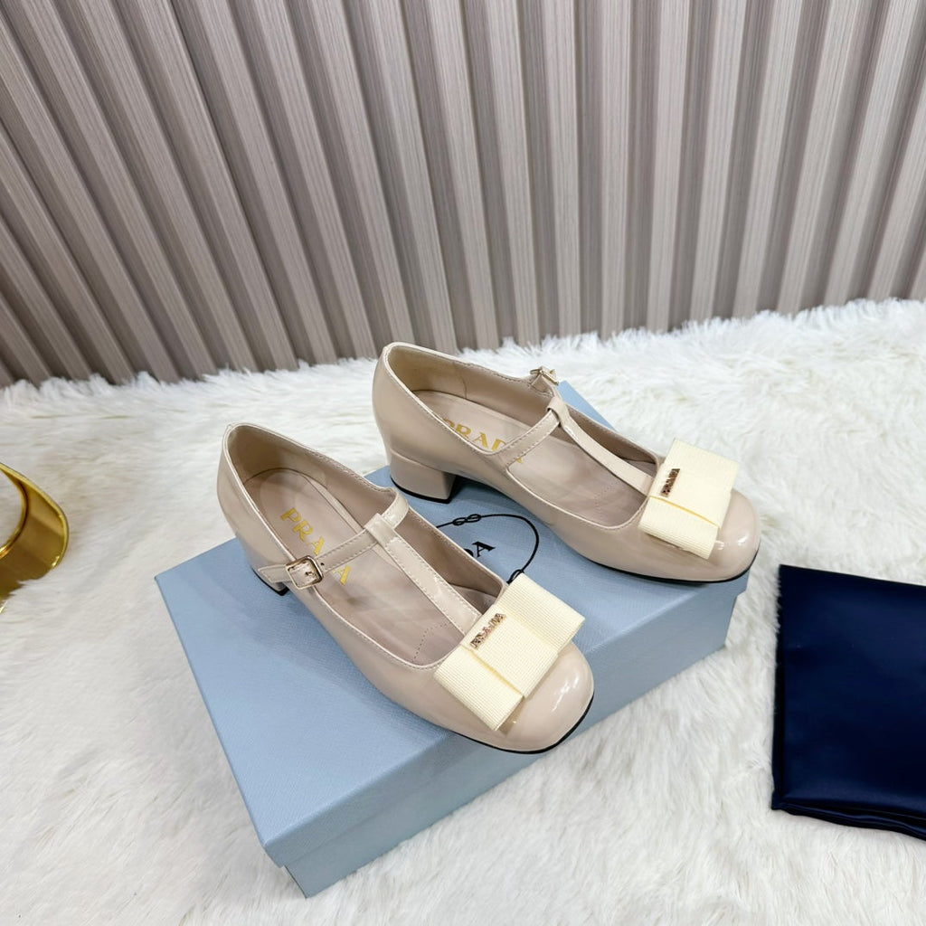 PRADA 26S T-STRAP MARY JANE PUMPS 40MM IN BEIGE PATENT CALFSKIN WITH BOW