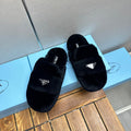 FLAT MULES IN BLACK RABBIT FUR