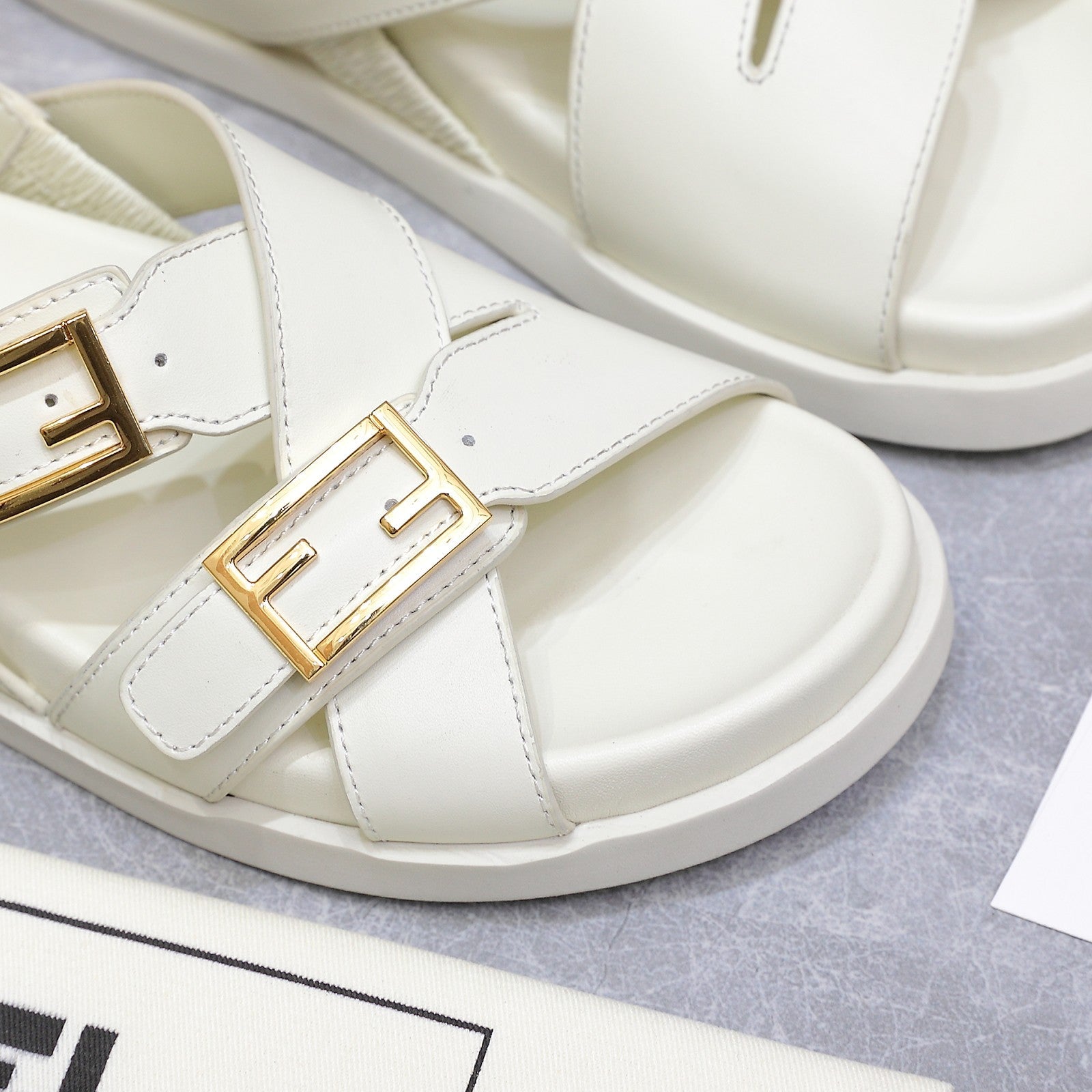 FENDI 26S FLAT SANDALS IN WHITE CALFSKIN