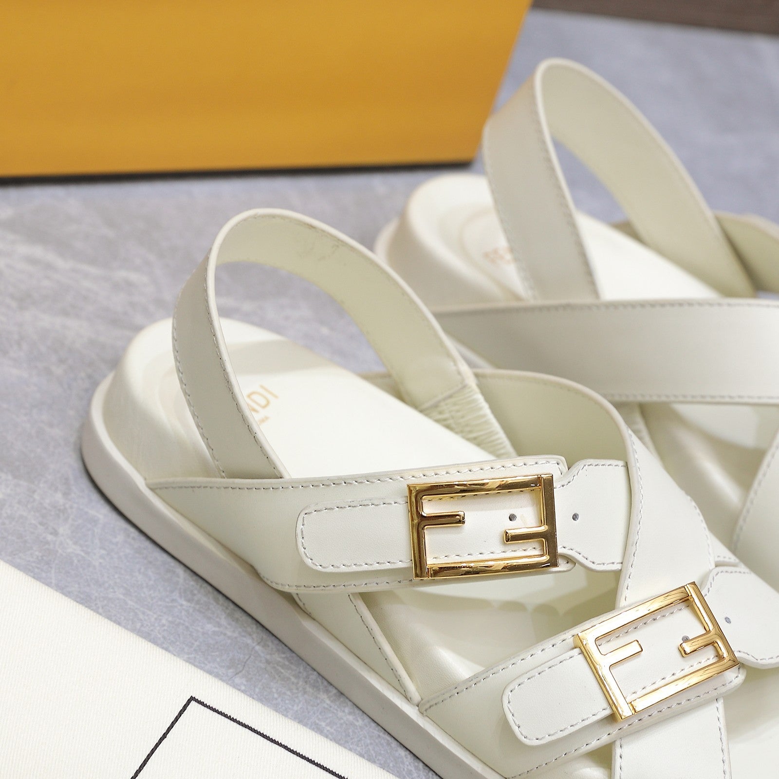 FENDI 26S FLAT SANDALS IN WHITE CALFSKIN