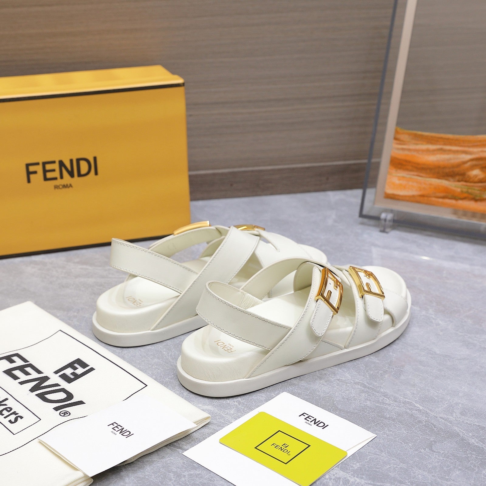 FENDI 26S FLAT SANDALS IN WHITE CALFSKIN