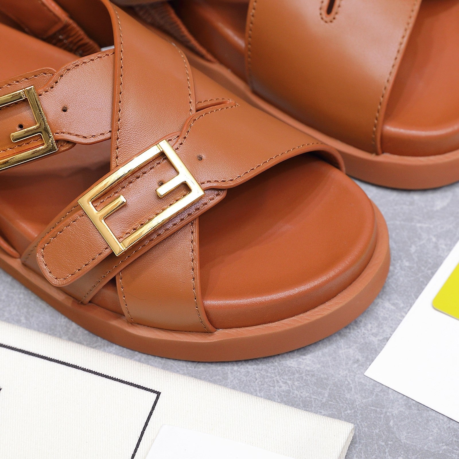 FENDI 26S FLAT SANDALS IN BROWN CALFSKIN