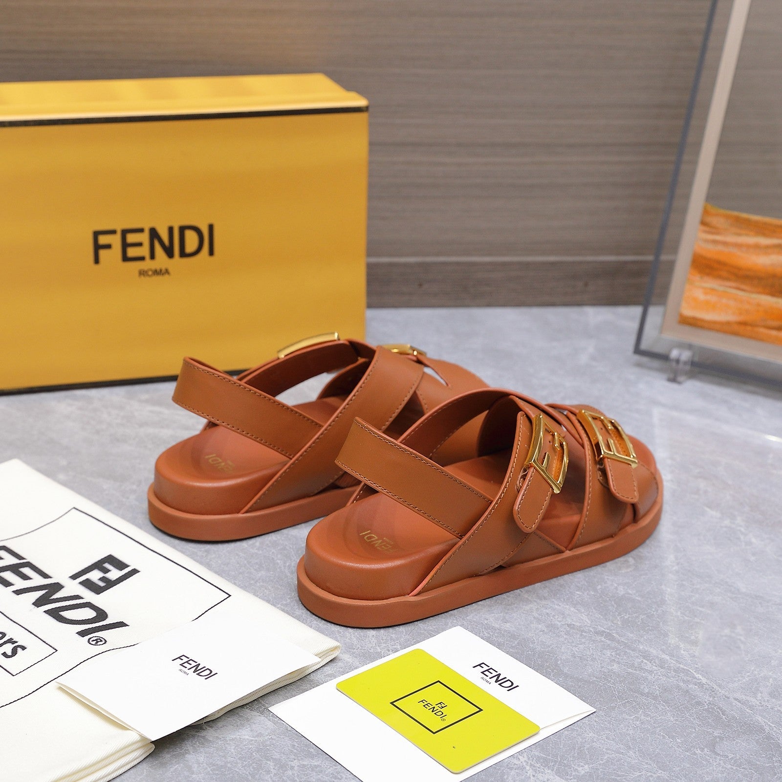 FENDI 26S FLAT SANDALS IN BROWN CALFSKIN