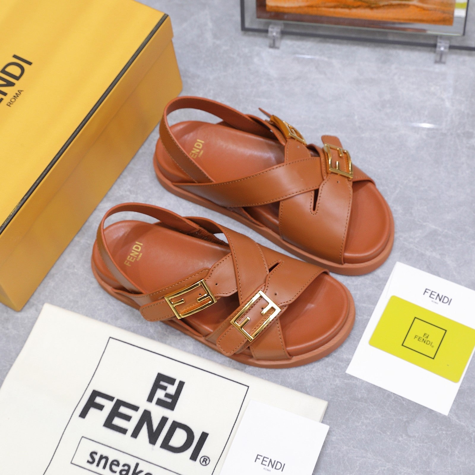 FENDI 26S FLAT SANDALS IN BROWN CALFSKIN