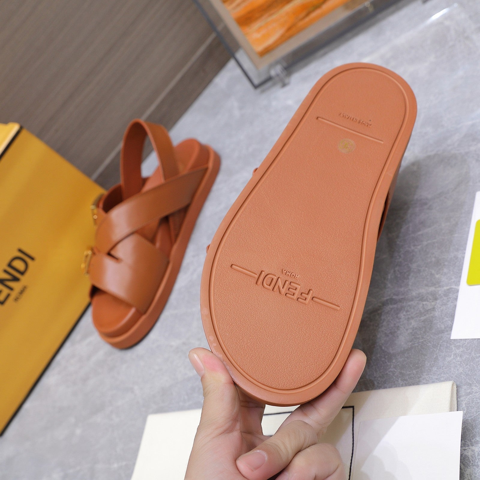 FENDI 26S FLAT SANDALS IN BROWN CALFSKIN