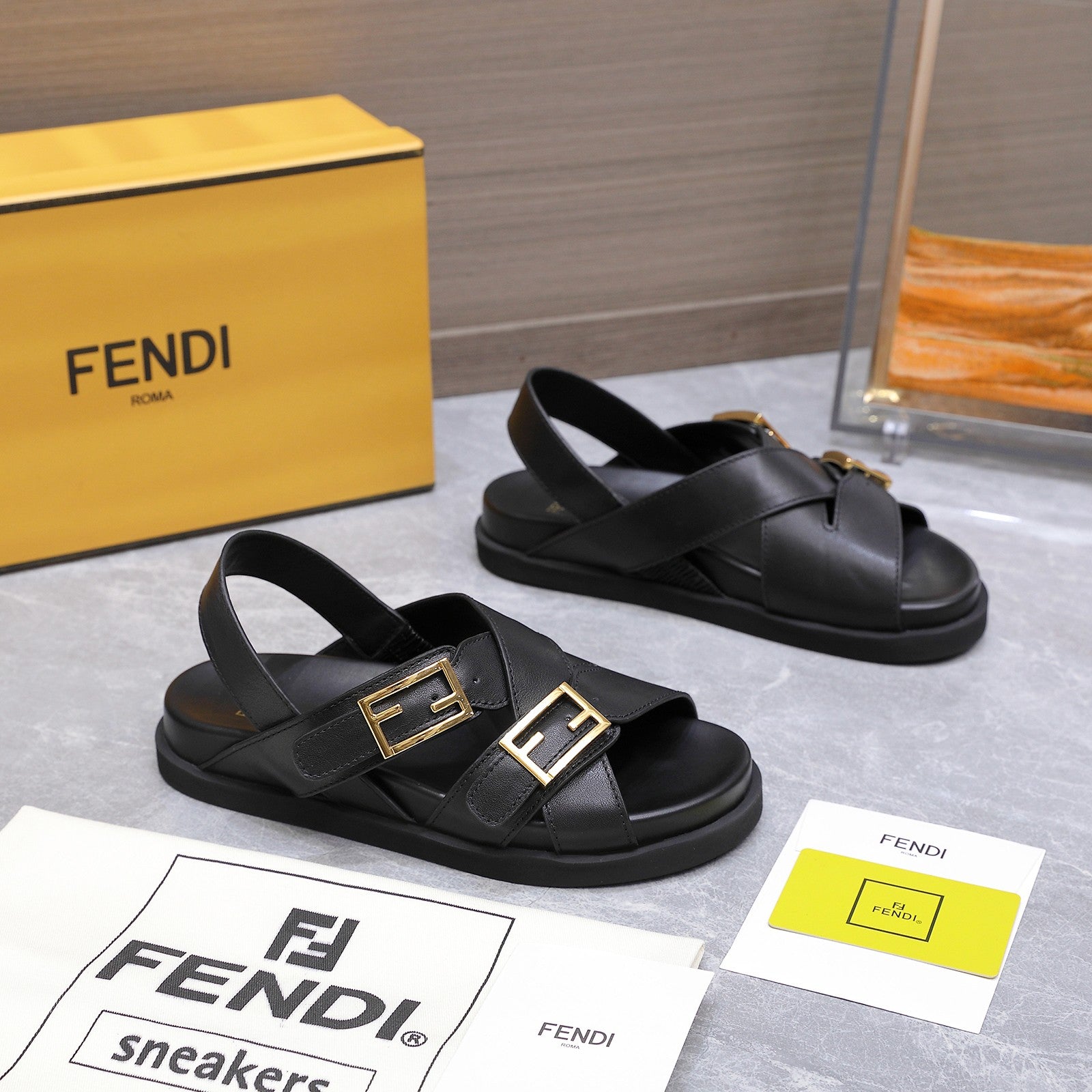 FENDI 26S FLAT SANDALS IN BLACK CALFSKIN