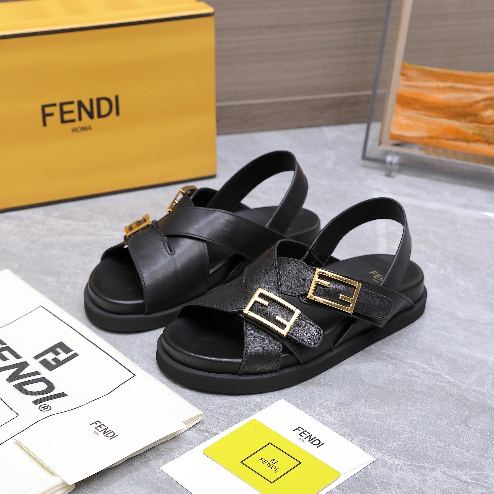 FENDI 26S FLAT SANDALS IN BLACK CALFSKIN
