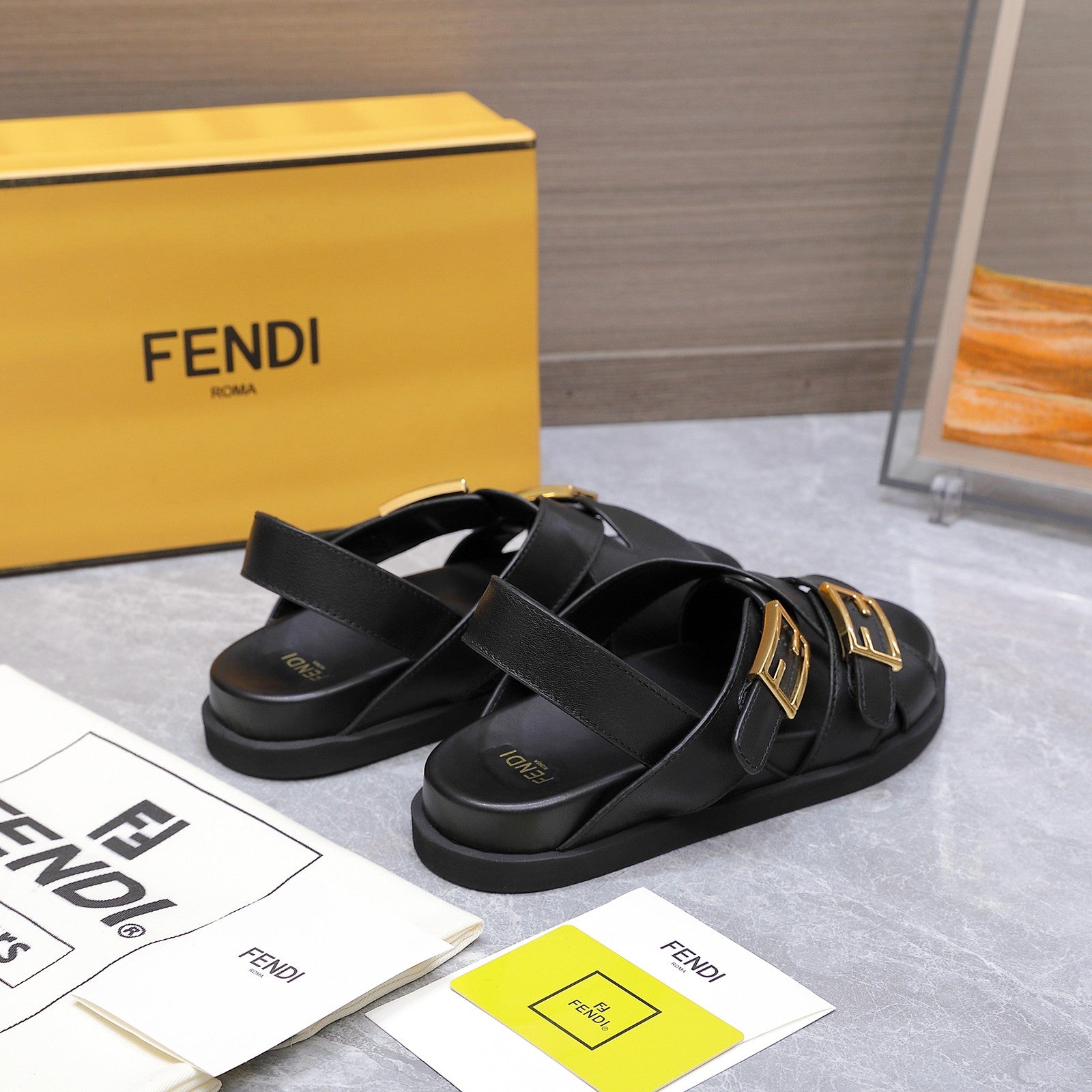 FENDI 26S FLAT SANDALS IN BLACK CALFSKIN
