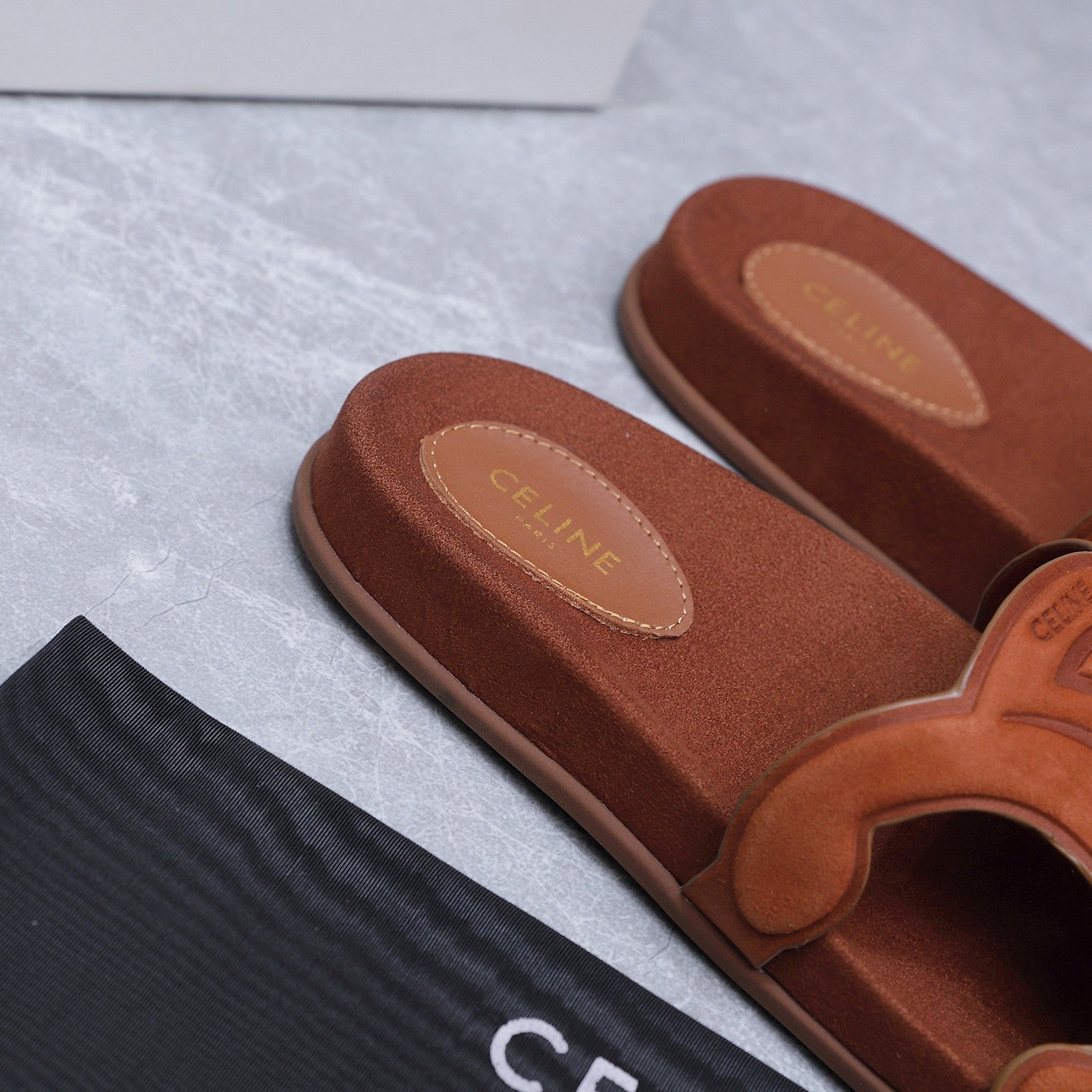 CELINE 26S TRIOMPHE SLIDES IN COGNAC BROWN SUEDE