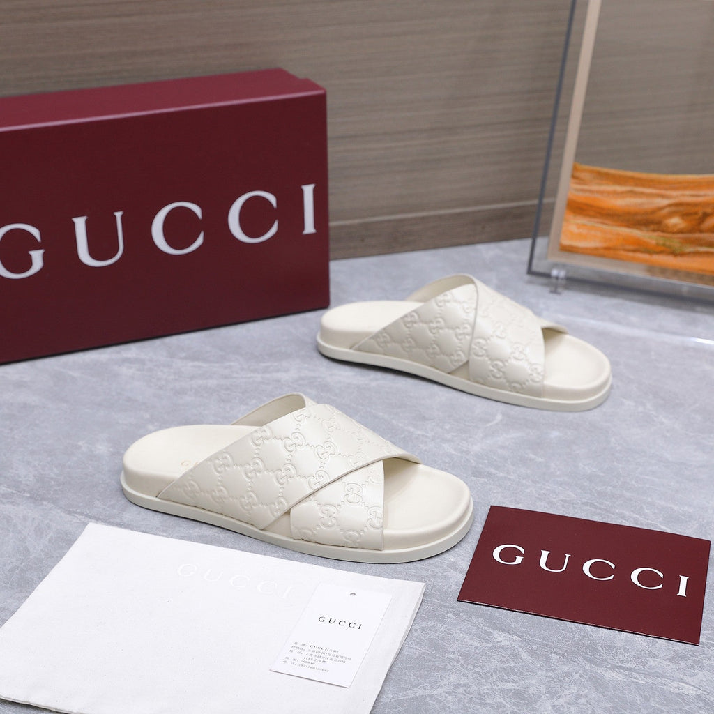GUCCI 26S CROSSOVER SANDALS IN WHITE GG EMBOSSED CALFSKIN
