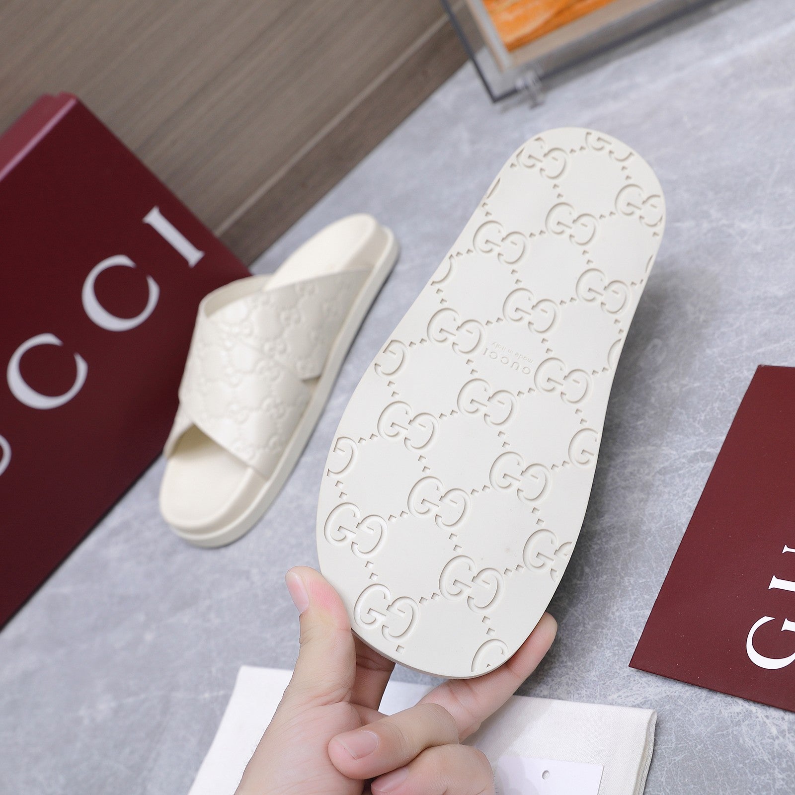 GUCCI 26S CROSSOVER SANDALS IN WHITE GG EMBOSSED CALFSKIN