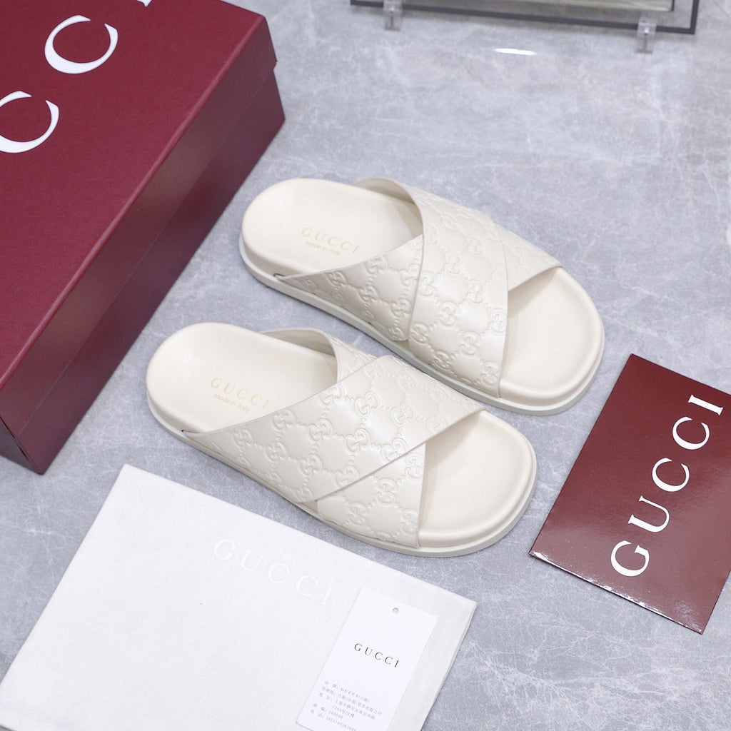 GUCCI 26S CROSSOVER SANDALS IN WHITE GG EMBOSSED CALFSKIN