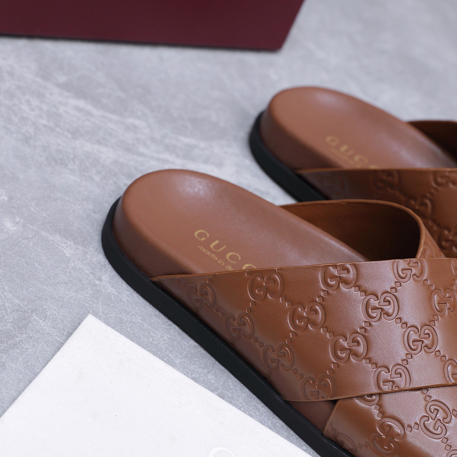 GUCCI 26S CROSSOVER SANDALS IN CARAMEL BROWN GG EMBOSSED CALFSKIN