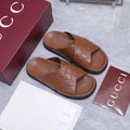 GUCCI 26S CROSSOVER SANDALS IN CARAMEL BROWN GG EMBOSSED CALFSKIN