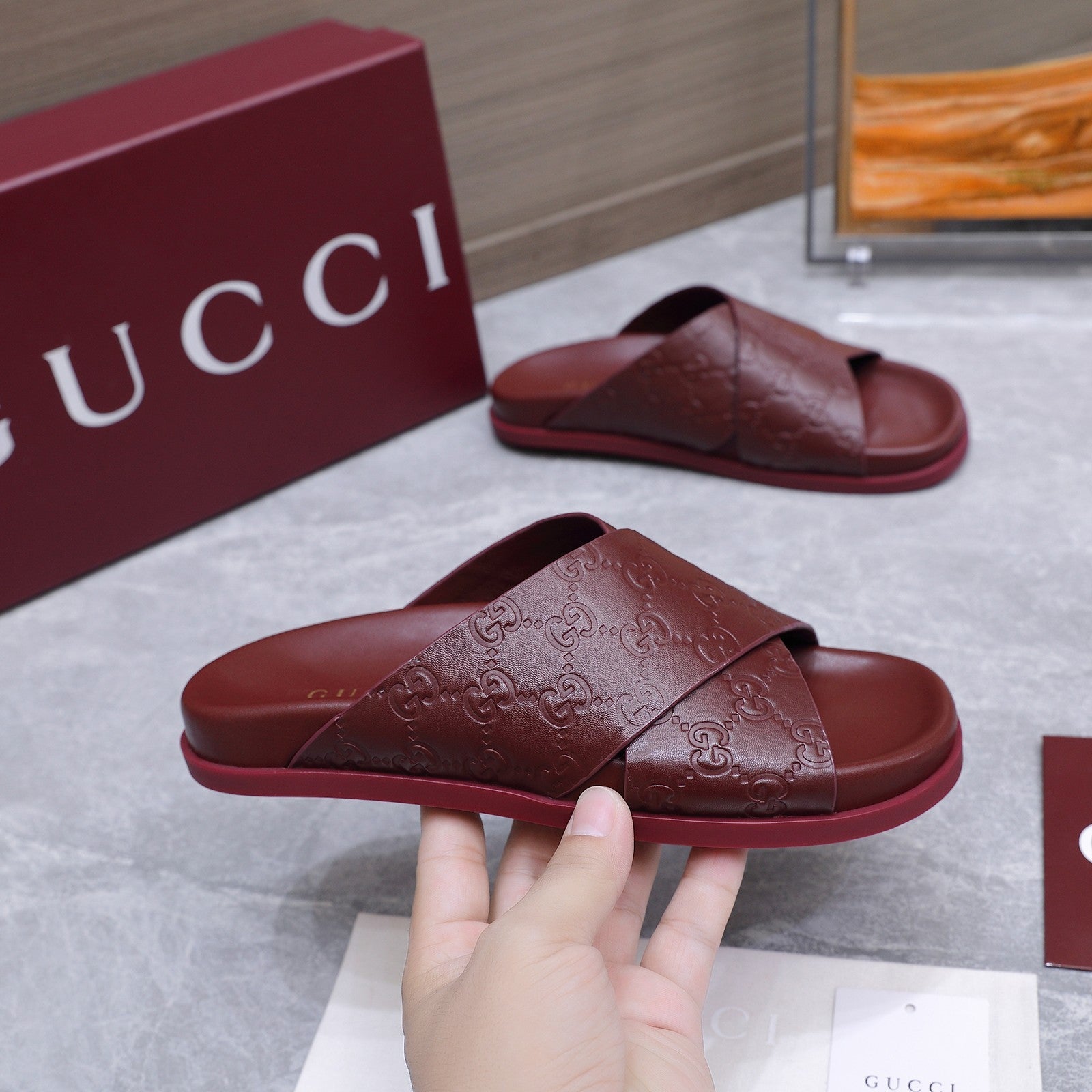 GUCCI 26S CROSSOVER SANDALS IN BURGUNDY RED GG EMBOSSED CALFSKIN