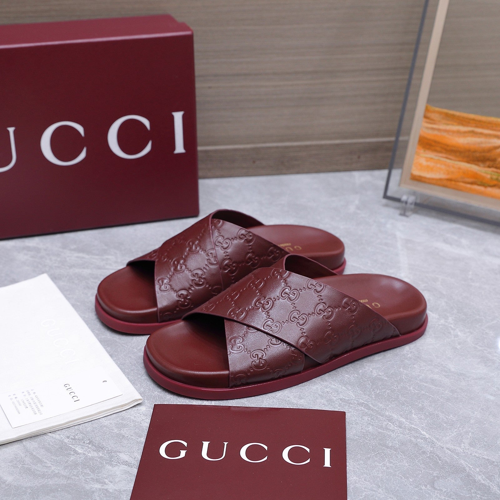 GUCCI 26S CROSSOVER SANDALS IN BURGUNDY RED GG EMBOSSED CALFSKIN
