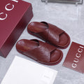 GUCCI 26S CROSSOVER SANDALS IN BURGUNDY RED GG EMBOSSED CALFSKIN