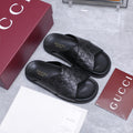 GUCCI 26S CROSSOVER SANDALS IN BLACK GG EMBOSSED CALFSKIN