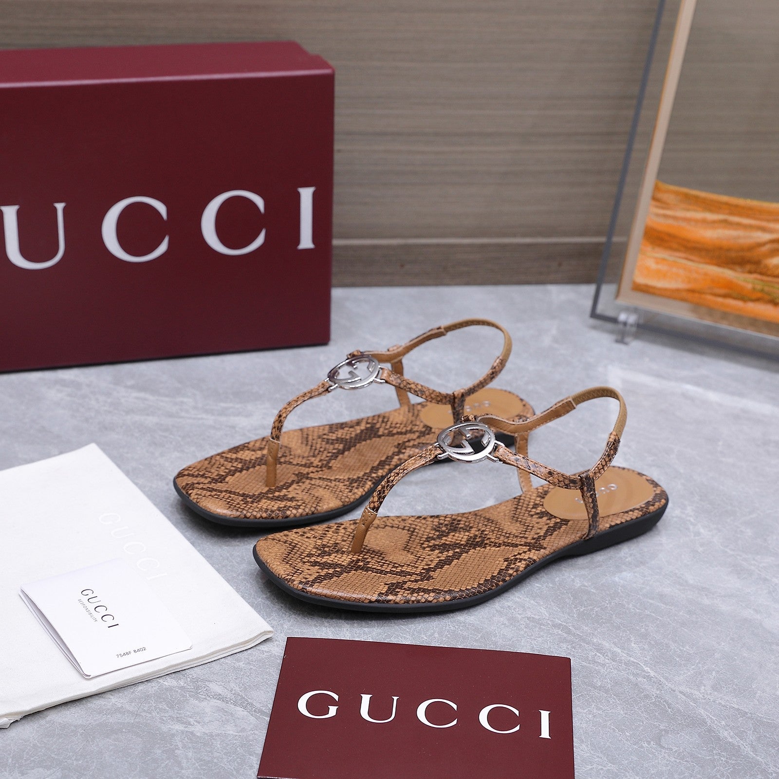 GUCCI 26S INTERLOCKING G THONG SANDALS IN BROWN PYTHON PRINT CALFSKIN